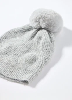 Berretto tricot con pon pom donna