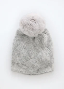Berretto tricot con pon pom donna