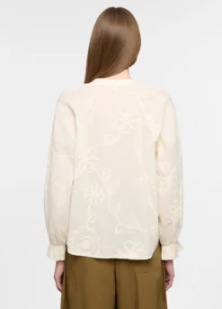 Blusa con scollo a V e ricami in puro cotone donna