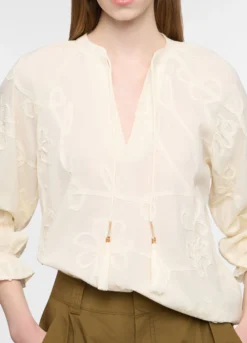 Blusa con scollo a V e ricami in puro cotone donna