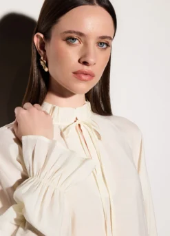 Blusa over fit con scollo a goccia donna