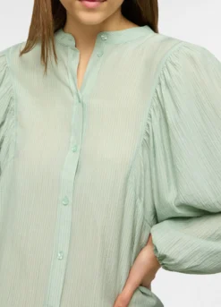 Camicia fit over coreana donna