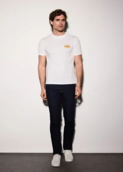 Jeans slim fit in denim di cotone elasticizzato uomo