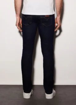 Jeans slim fit in denim di cotone elasticizzato uomo