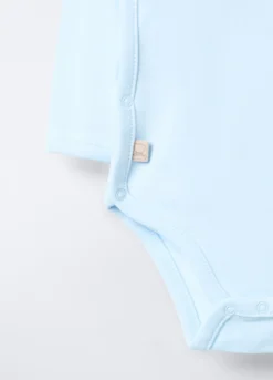 Pack 2 body incrociati in interlock di puro cotone neonata