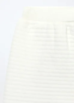 Set in matelassé misto cotone neonata